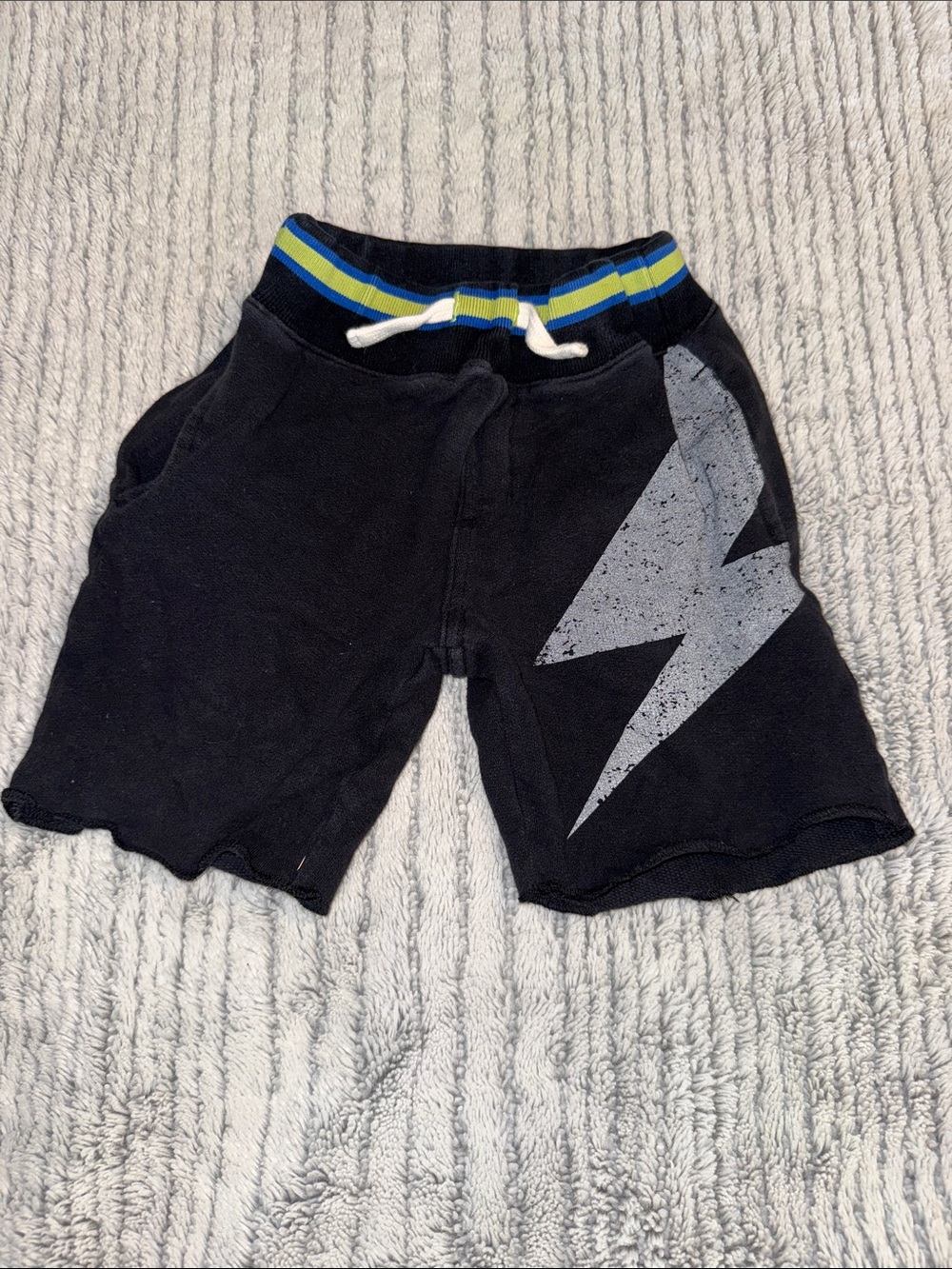 Boys Black Shorts with Gray Lightning Graphic and Striped Waistband